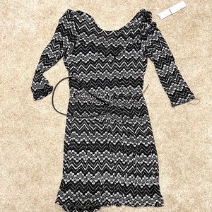 New, with tags. Never worn.